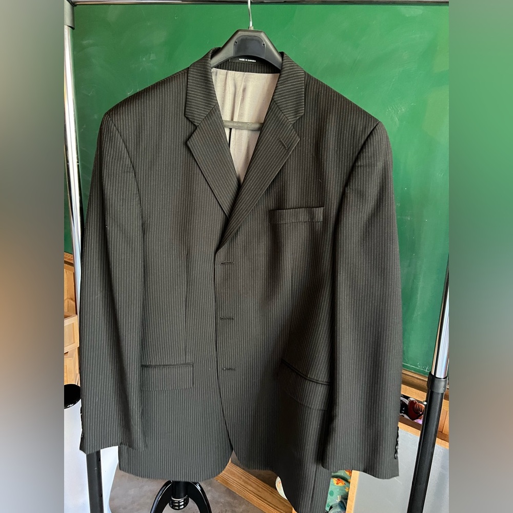 Suit. Pinstripe. Black and gray. Calvin Klein.
